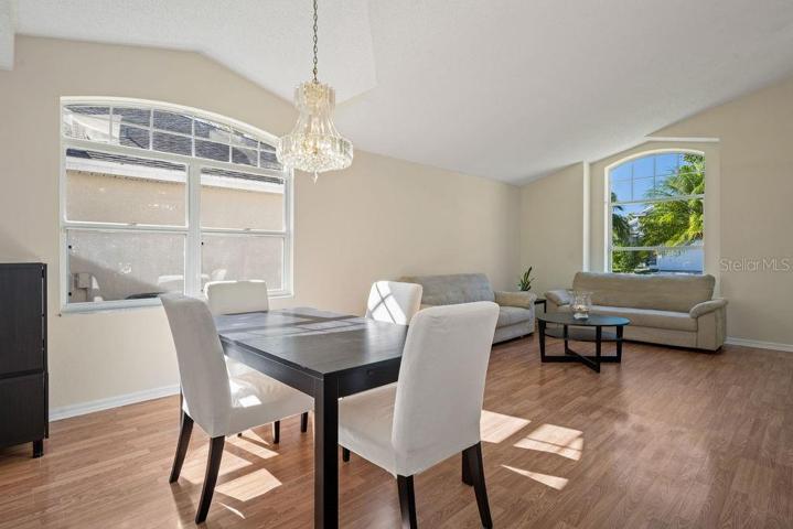 Showcasing dining area with windows for great natural light.