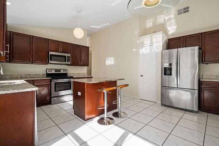 Kitchen highlighting additional storage and pantry closet.
