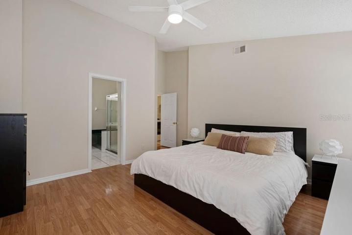 Owner's Suite with en-suite and direct access via double doors to a multi-use room, such as a sitting room, exercise room or office.
