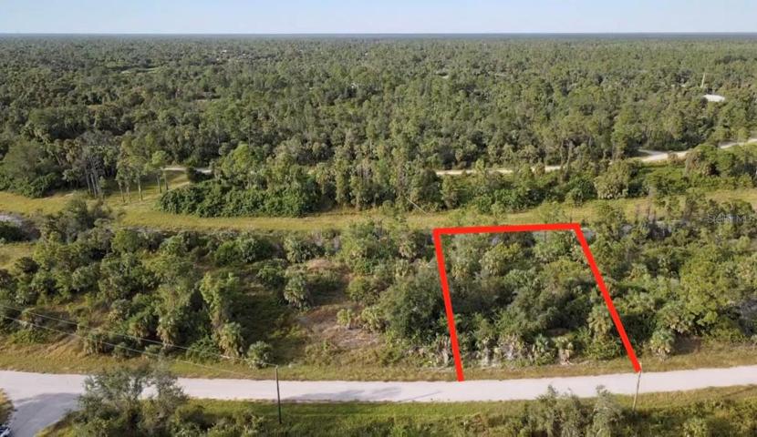 Front view of property showing power lines.