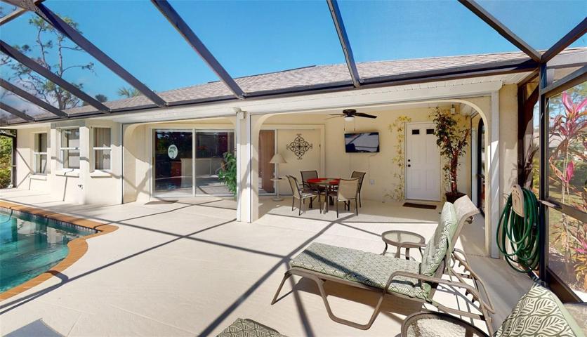 Looking at area under roof which has hurricane shutters.