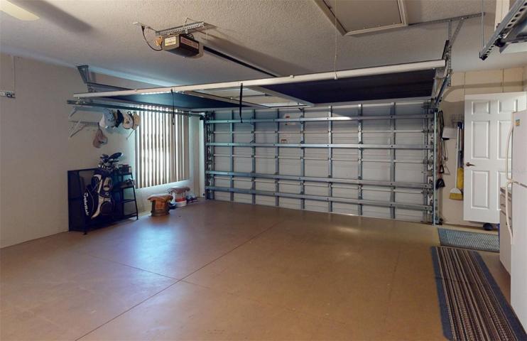 Hurricane garage door.  Notice a screened that pulls down when garage door is up.