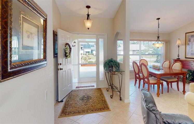Entry way looking back, with views of dining area.