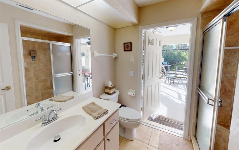 Master bath view out to pool