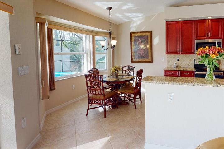 Looking from living room towards kitchen and breakfast nook.