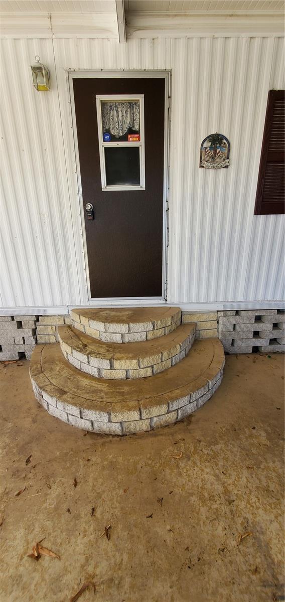 carport entrance door.  The SUPRA key box is NOT on this door.  Go to the FRONT door.