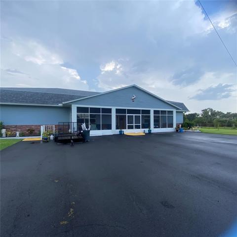 new asphalt parking lot with security gates