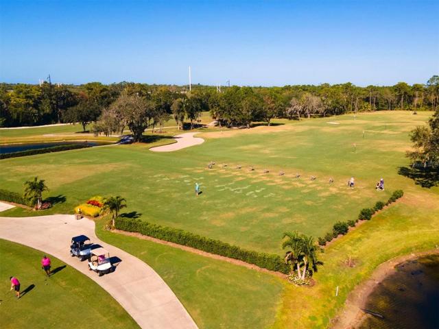 Home is located next to the driving range! Hit some balls and how convenient to walk home!