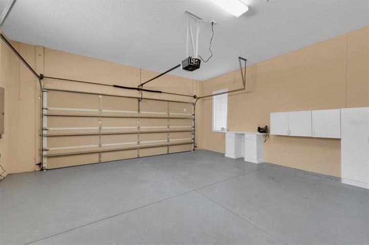 Two car garage with storage areas!
