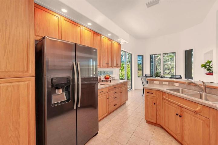 The kitchen is bigger than a galley but, has tons of workspace and cabinetry!