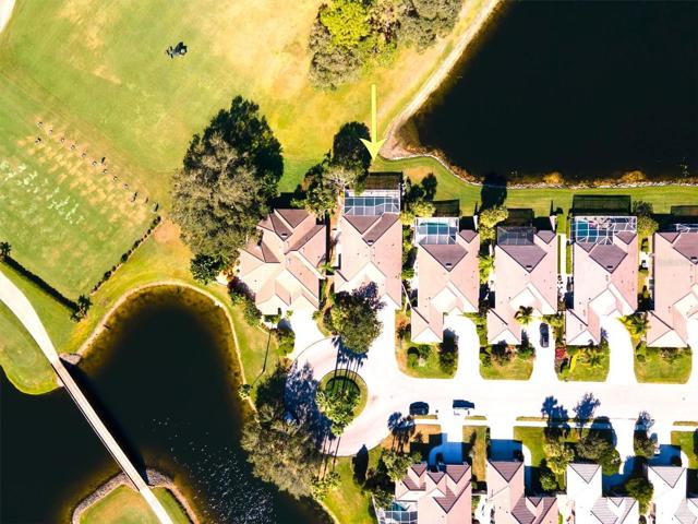 Drone view showing location of home and note the close proximity to the driving range!