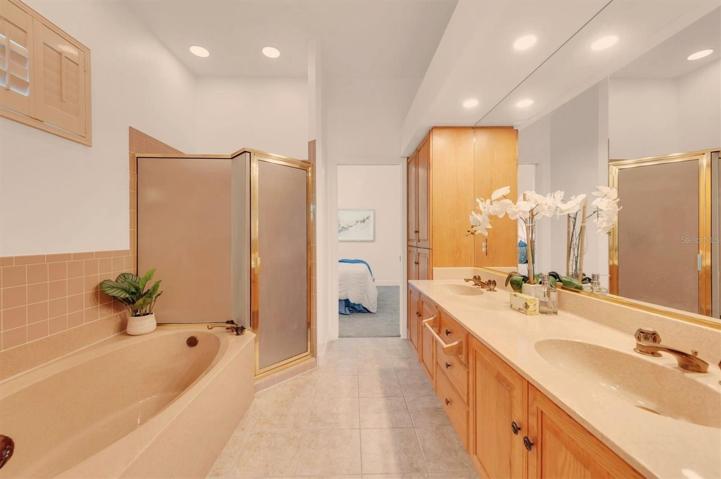 Master bath located next to the master bedroom! This bath leads to the second bedroom.
