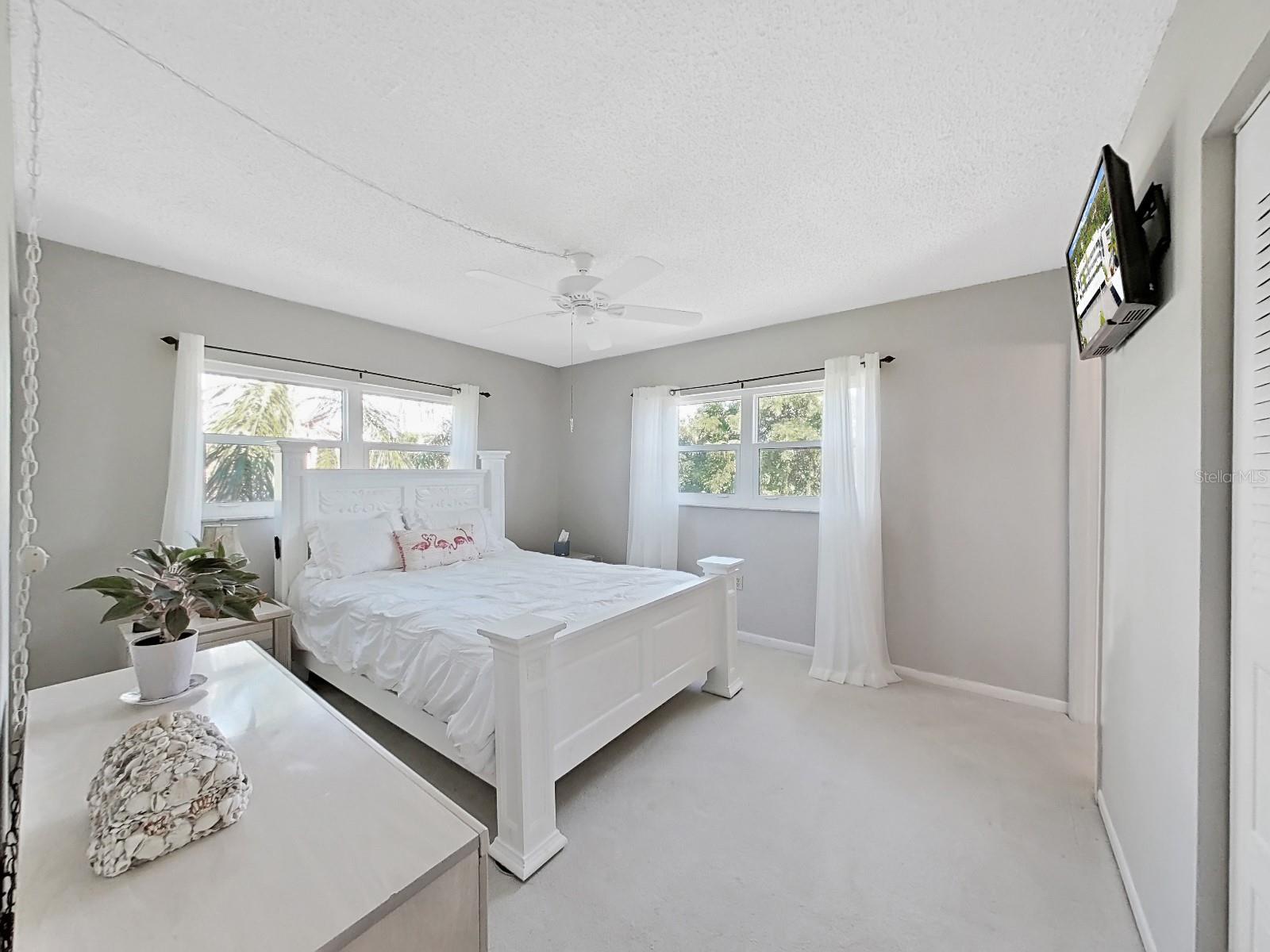 Lovely airy primary bedroom with en-suite