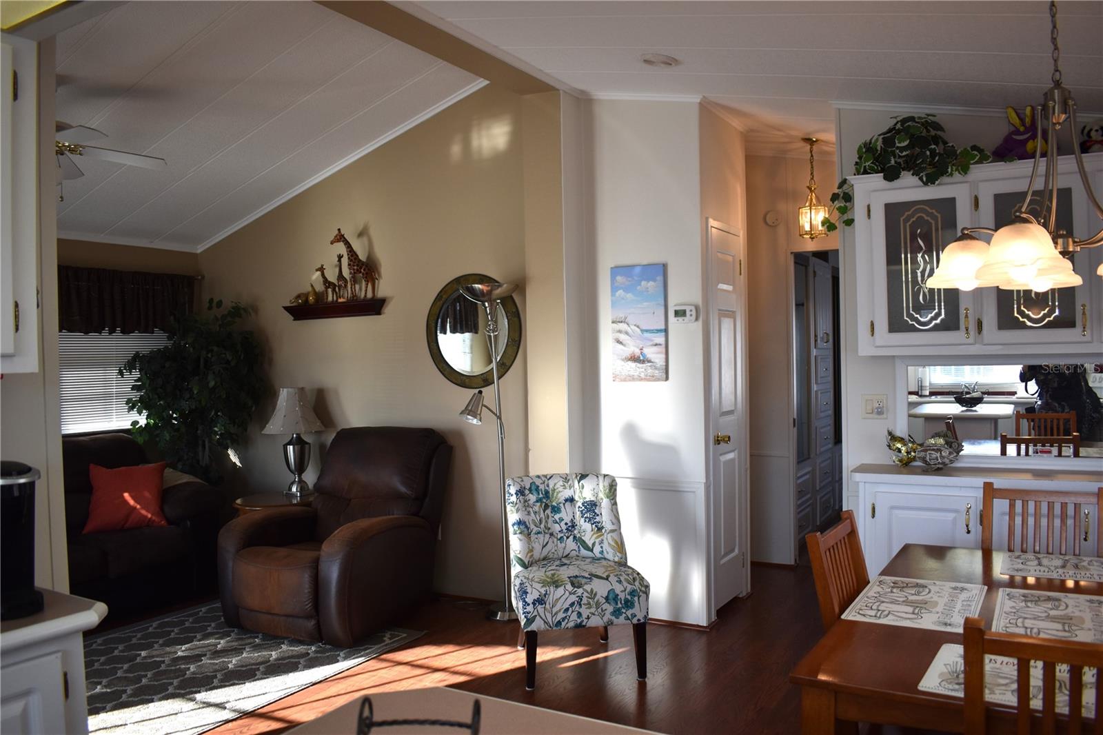 Living and dining rooms adjoin kitchen area for a well thought out living space