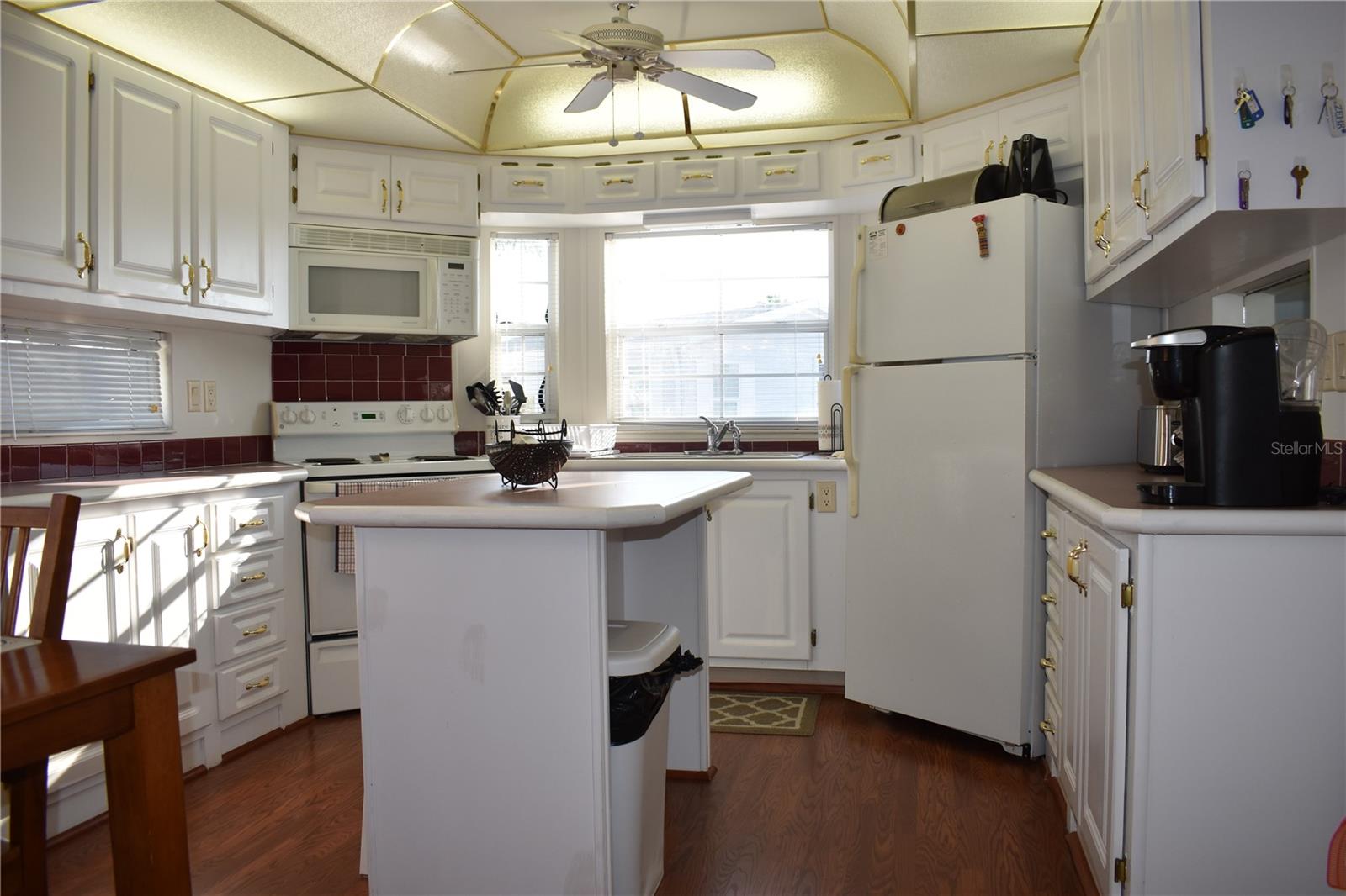 Kitchen island provides eating space in the kitchen or additional workspace