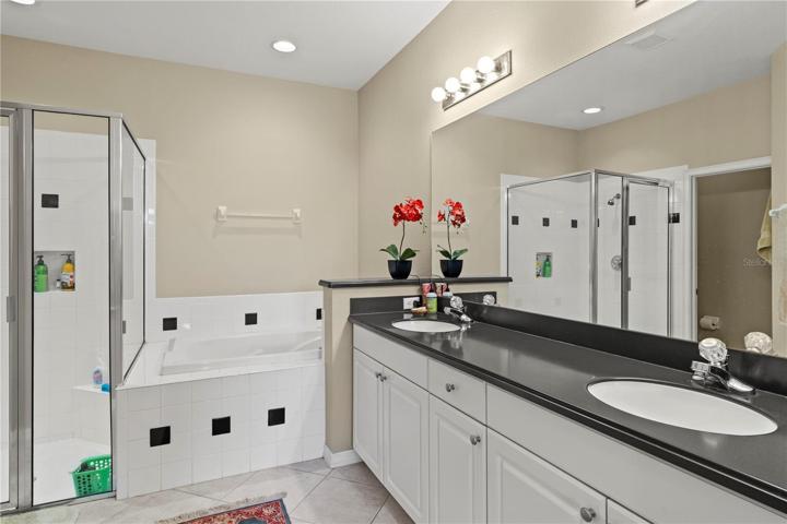 Primary bath with separate tub and dual sinks