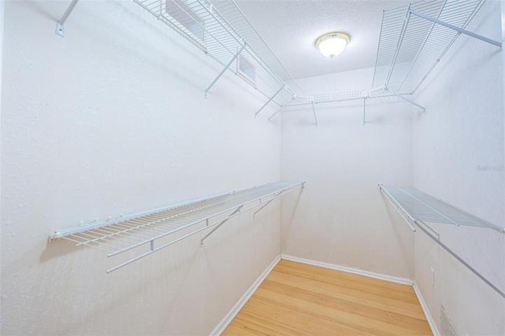 Walk-in shared closet for second and third bedroom