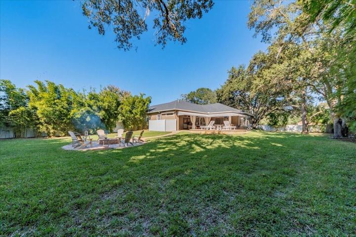 PROPERTY OFFERS A PVC FENCED IN HOMESITE FOR PRIVACY IN ADDITION THERE IS EXTENSIVE TALL BAMBOO LANDSCAPE ADDED TO THE PERIMETER FOR ADDITIONAL BEAUTY AND PRIVACY.