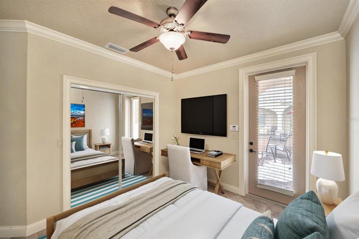 Lower floor, third bedroom also includes tile floors, mirrored glass closet, and crown molding.