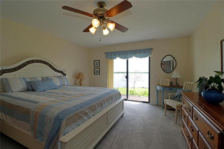 Primary bedroom has slider to private deck