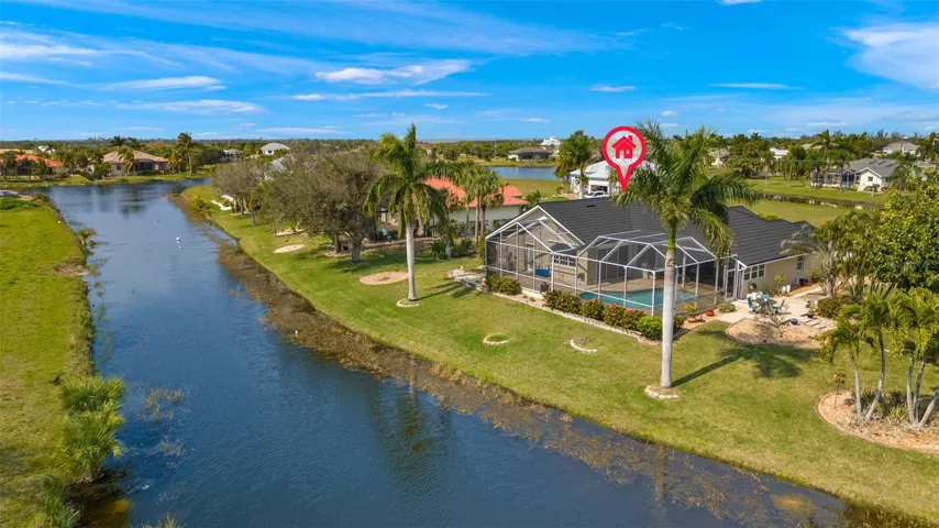 Your Tropical Oasis is beautifully landscaped with lots of self pruning Palm trees!