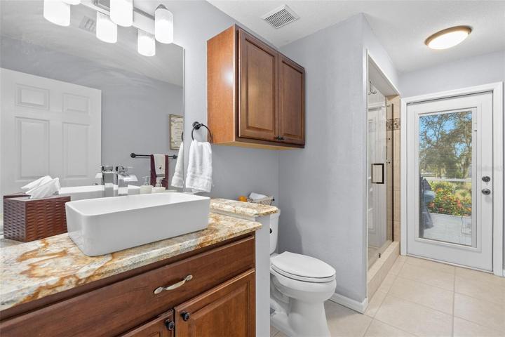 Second bath serves as  guest and pool bath