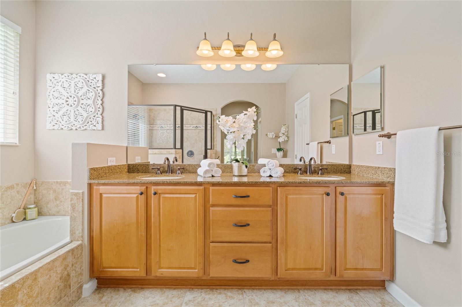Master Bathroom w/ dual sinks, quartz countertop, soaking tub &amp; glass enclosed walk-in shower