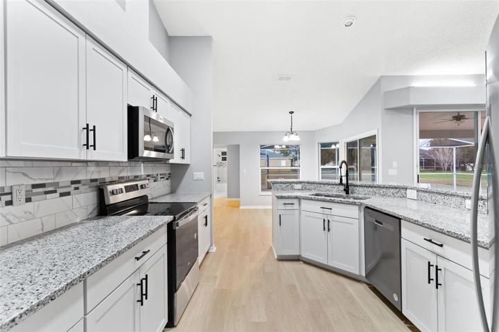 Modern Kitchen with New appliances, Highend Cabinets & Granite Counter tops