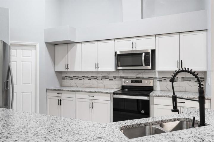 Modern Kitchen with New appliances, Highend Cabinets & Granite Counter tops
