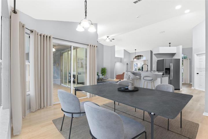 *Virtually Staged* Dinning Room & Kitchen, Modern Design, Chandelier, & Open Concept