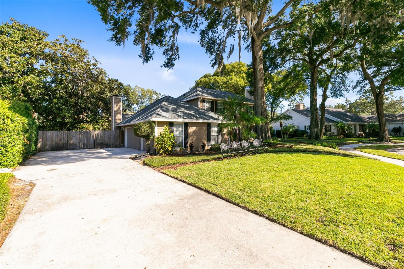 A long driveway and two car garage provides plenty of parking.
