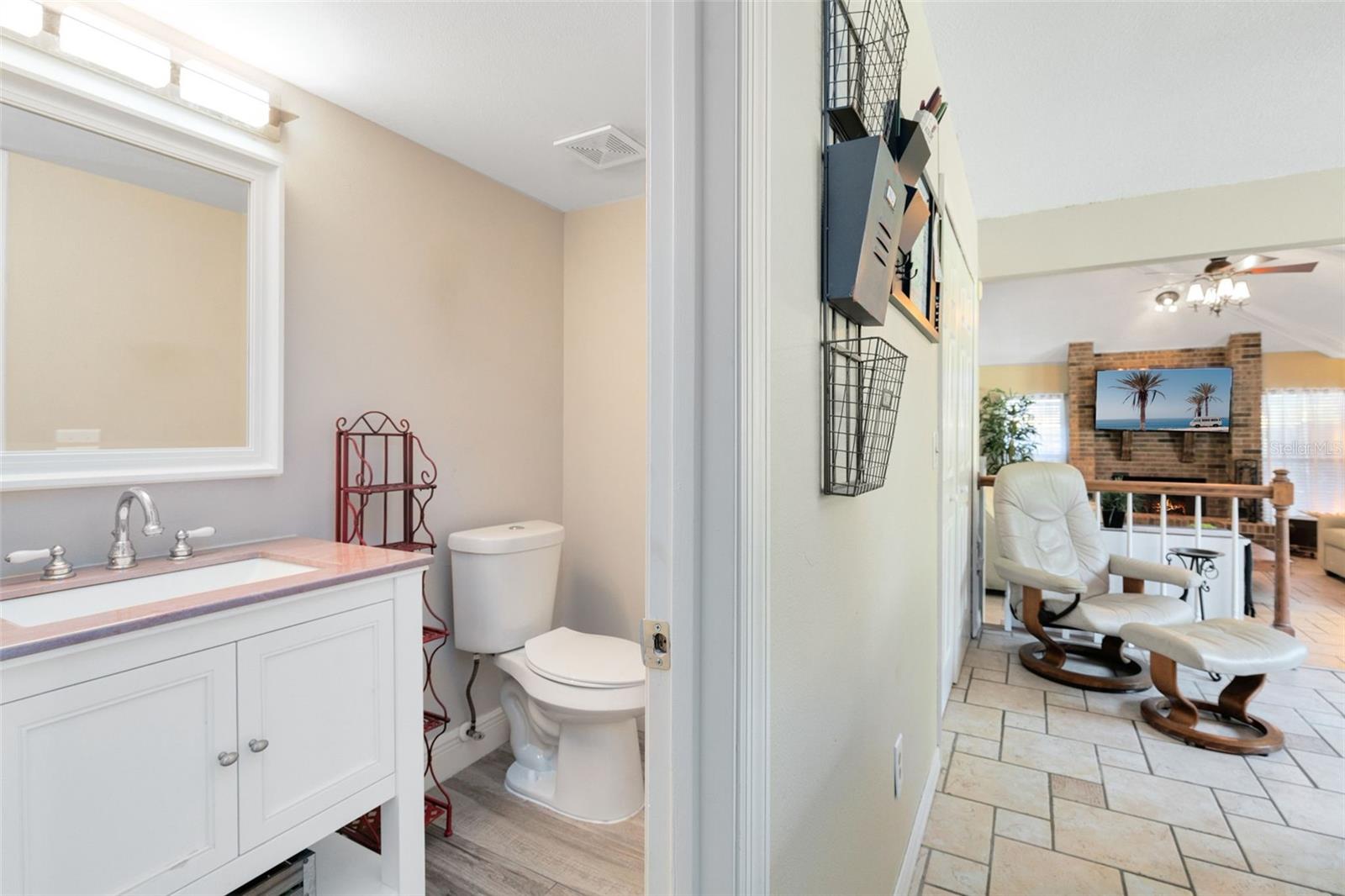 A half bath just off the family is perfect for guest use.