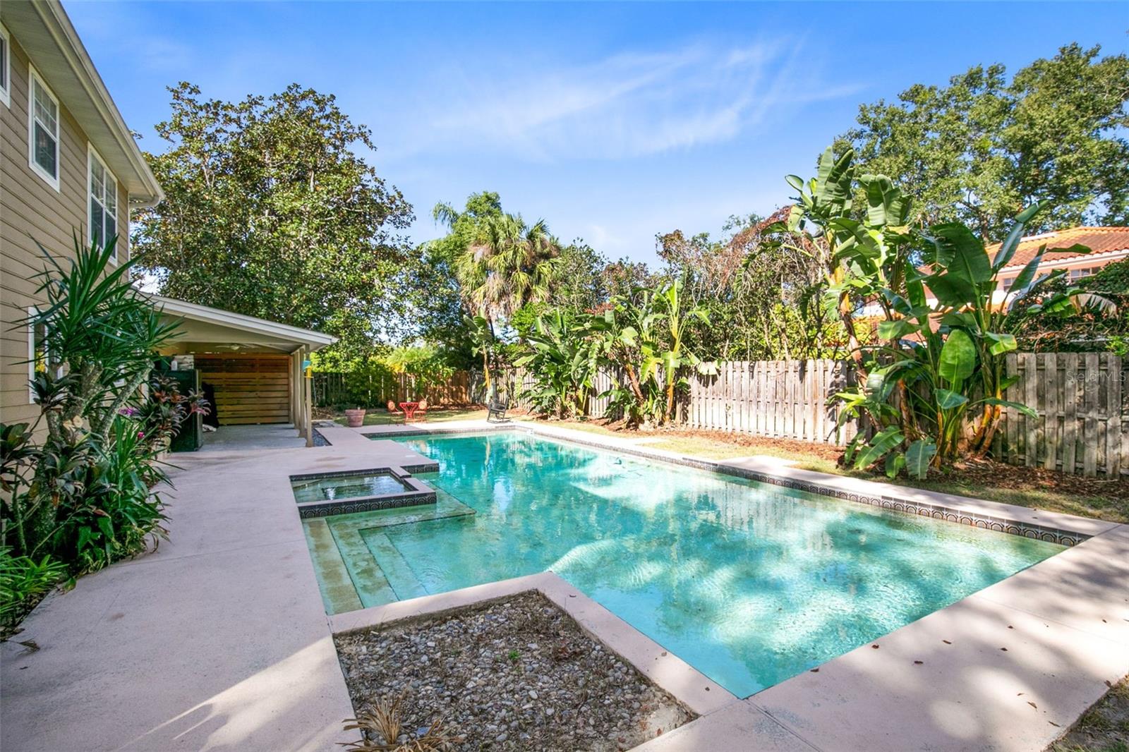 The large fenced backyard is ideal for enjoying the fantastic Florida weather