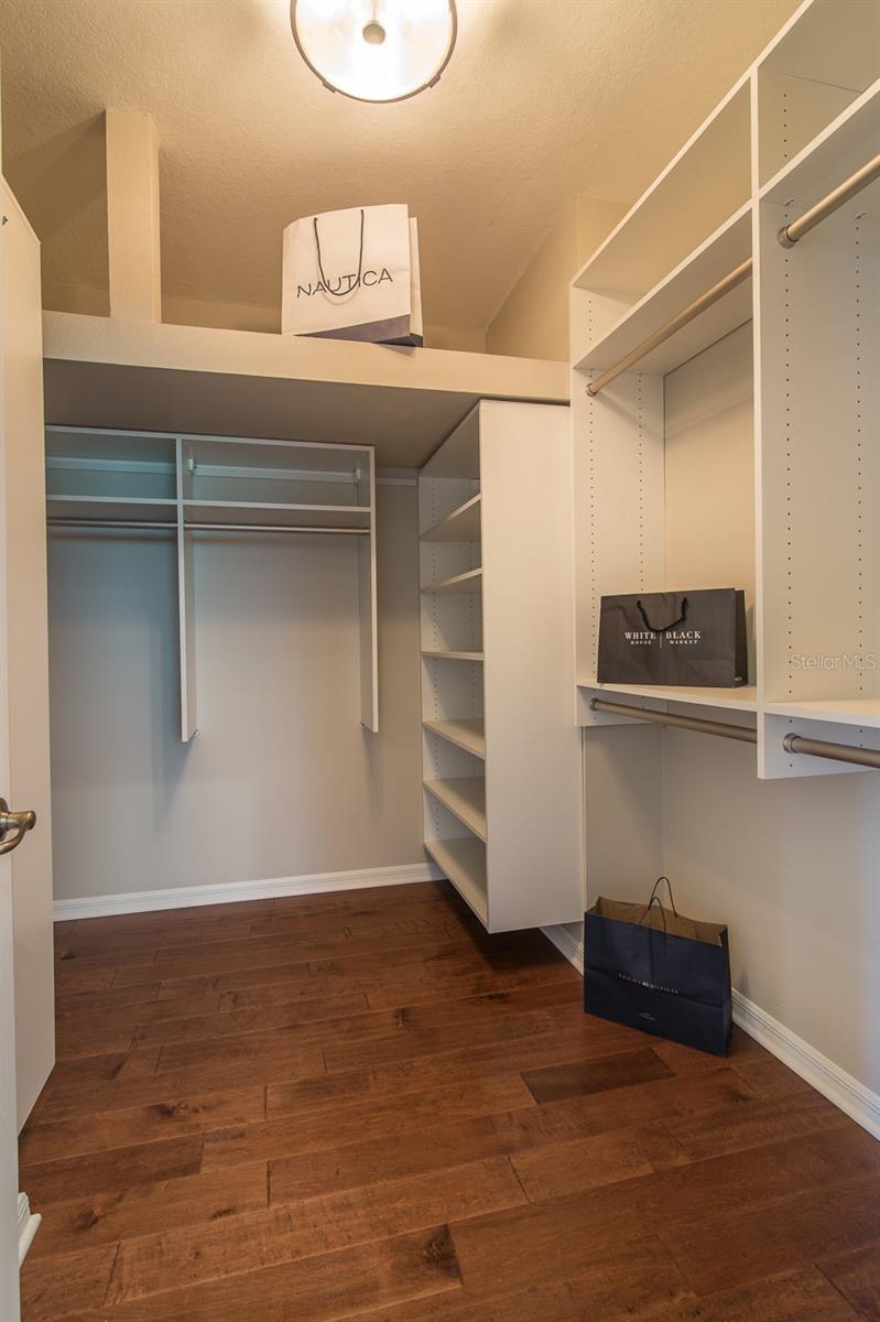 Huge Walk In Closet with system