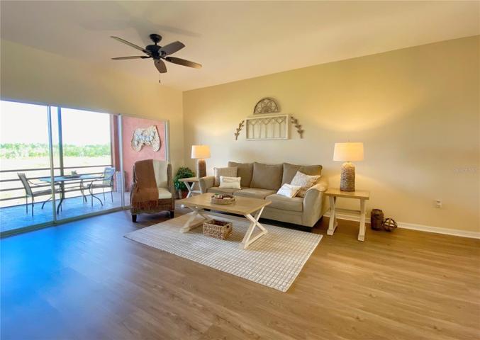 Living Room with Triple Sliders