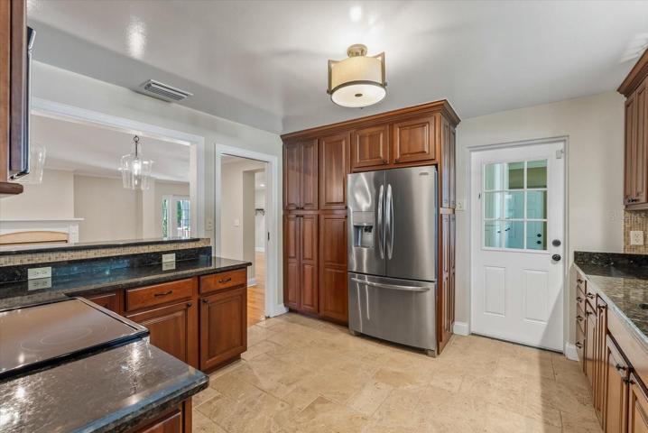 Mudroom off the kitchen leads to the garage