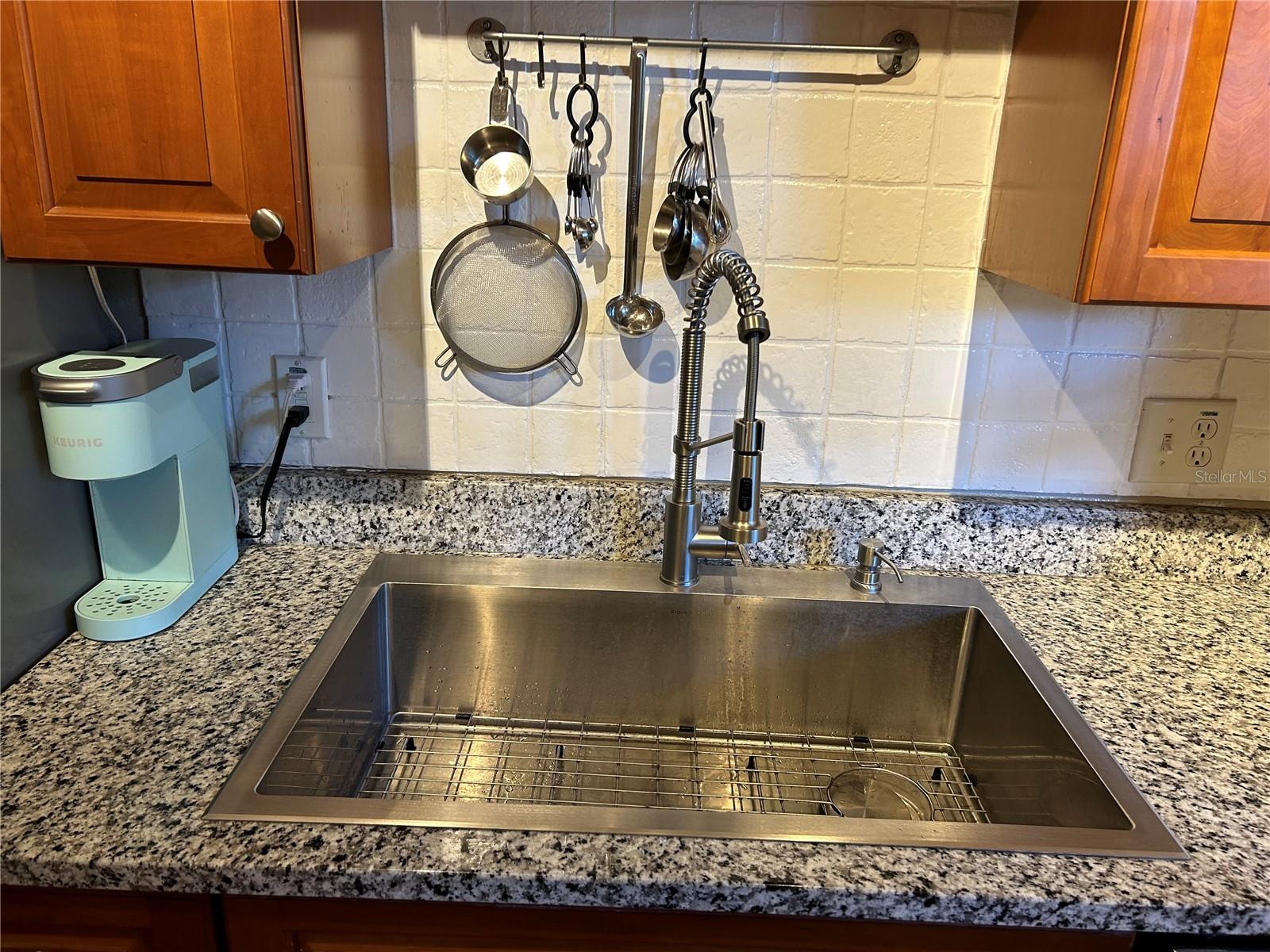 Farmhouse style deep sink with new goose-neck faucet.