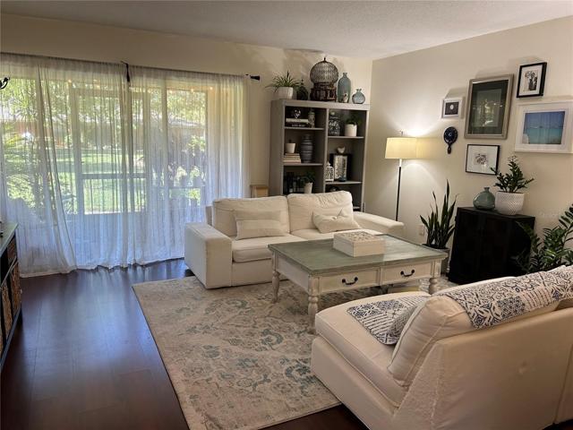 Living area with patio beyond.