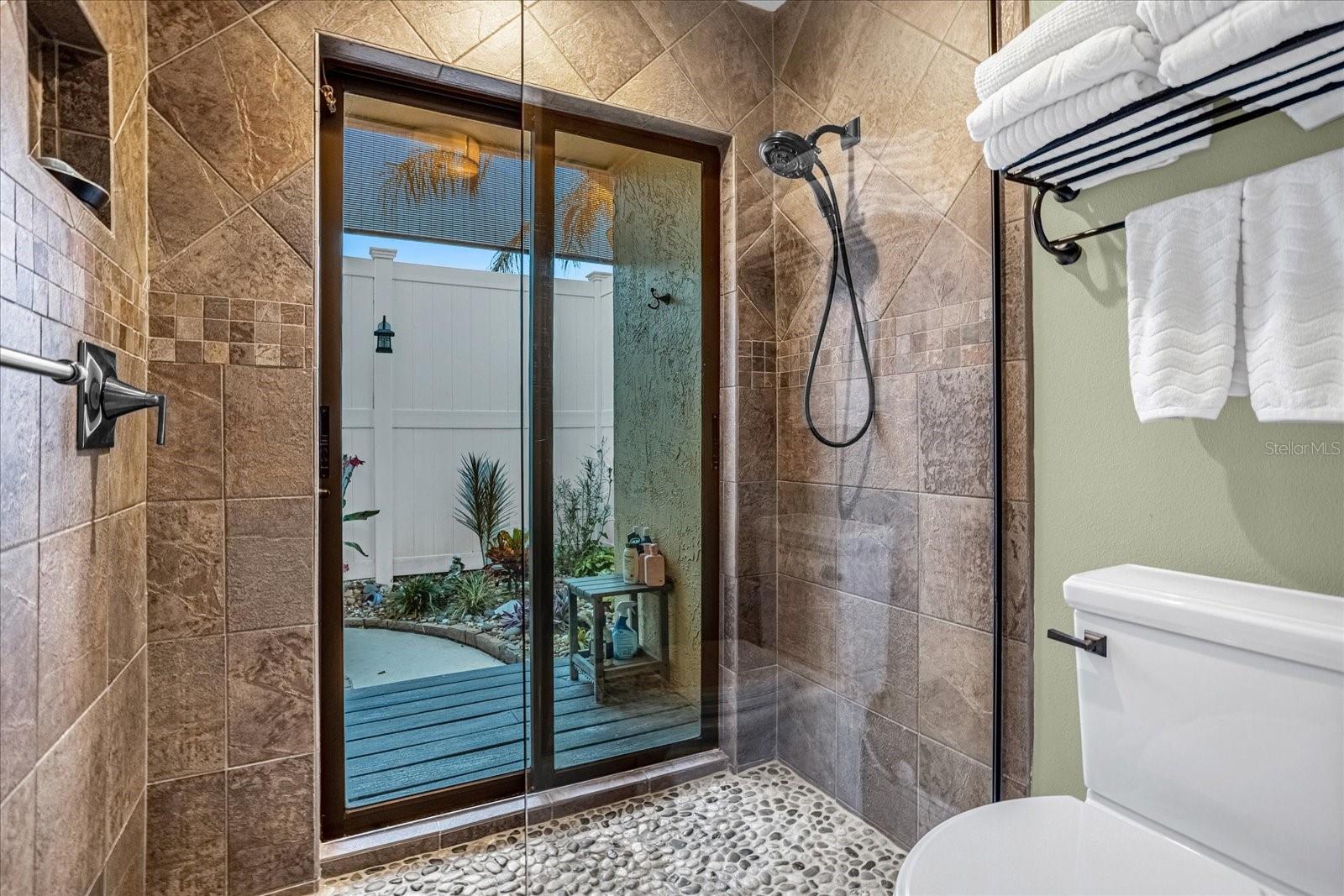 Master Bath Interior Shower to slider to Garden Shower