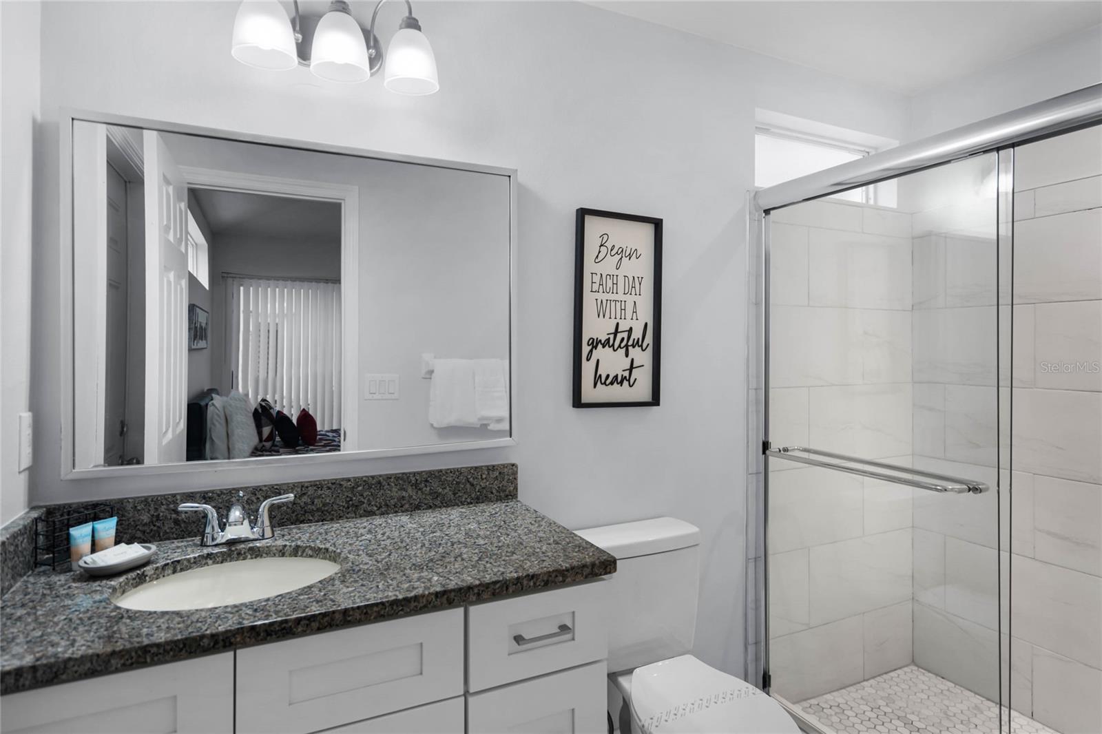 Fully renovated master bathroom with pool access