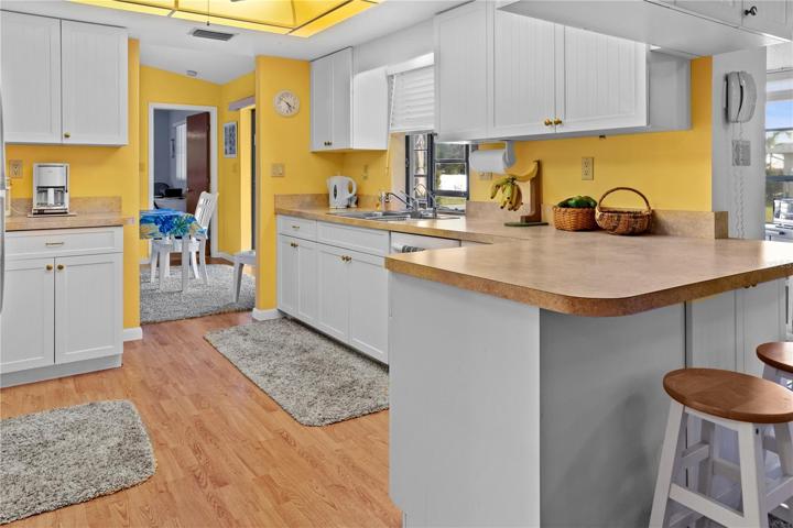 It's a cook's kitchen with easy access to either side of the home.