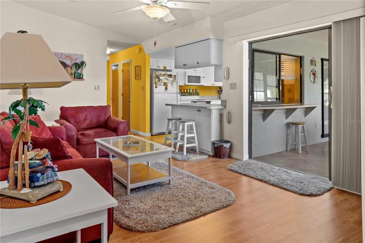 There is Lanai access from the Family Room, and note the pass-through window from the Kitchen into the Lanai.