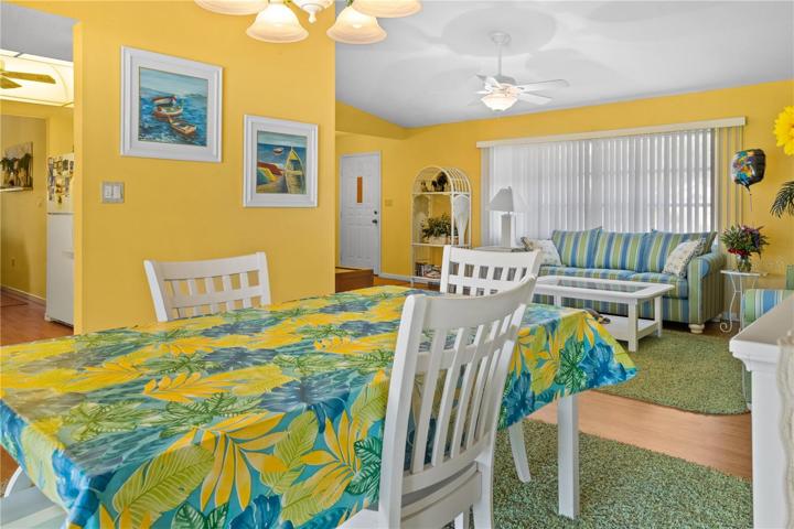 Just off the Living Room is the Dining Room.  It passes through into the Kitchen.