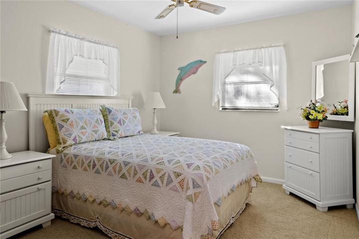 Second bedroom has two windows and a large closet.
