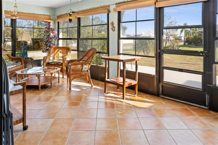 Here's the Lanai.  It has ceramic tile floors and windows.  It's a perfect spot to enjoy sunlight, or entertain guests.