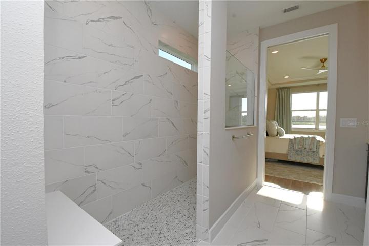 The primary ensuite offers a spa like experience.