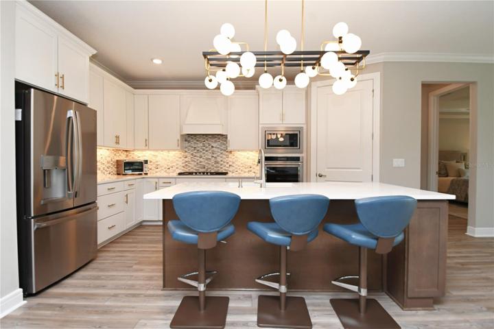 The breakfast bar seats three comfortably.