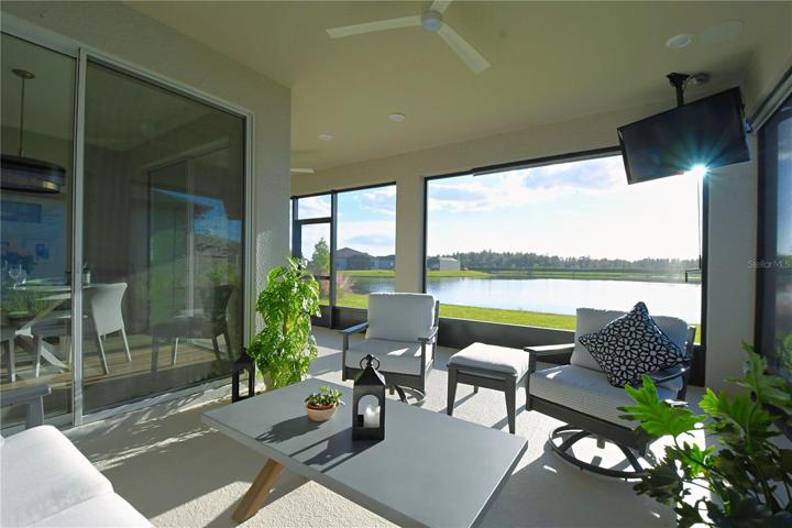 The large L-shaped screened in back porch is ideal for the indoor-outdoor lifestyle.