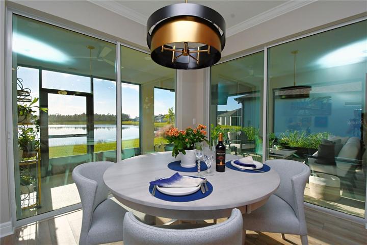 The 'cafe' opens to the screened in porch creating that indoor-outdoor experience.