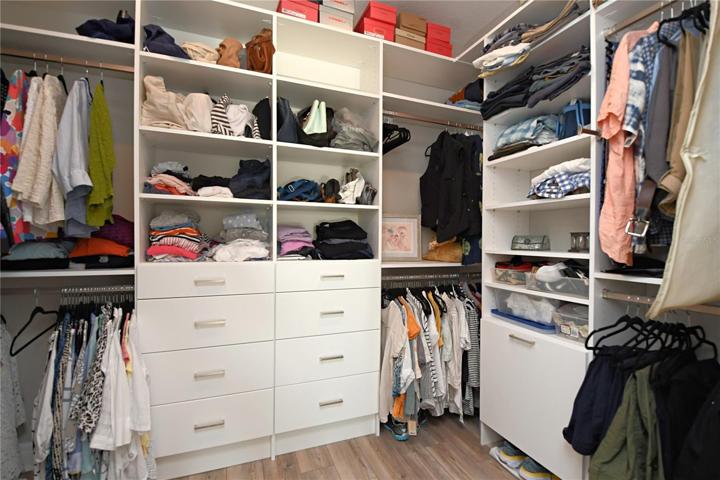 The primary suite features a custom built, walk-in closet.